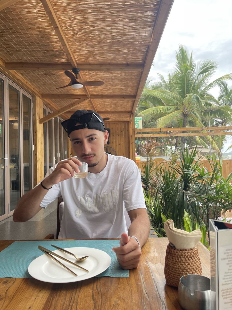 Ali at a café in Thailand